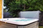 Enjoy the large hot tub on the patio 